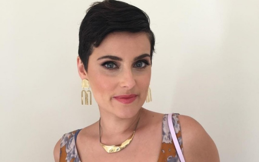 nelly-furtado-cantora-apaixonada-por-rapper-de-27-anos.jpg